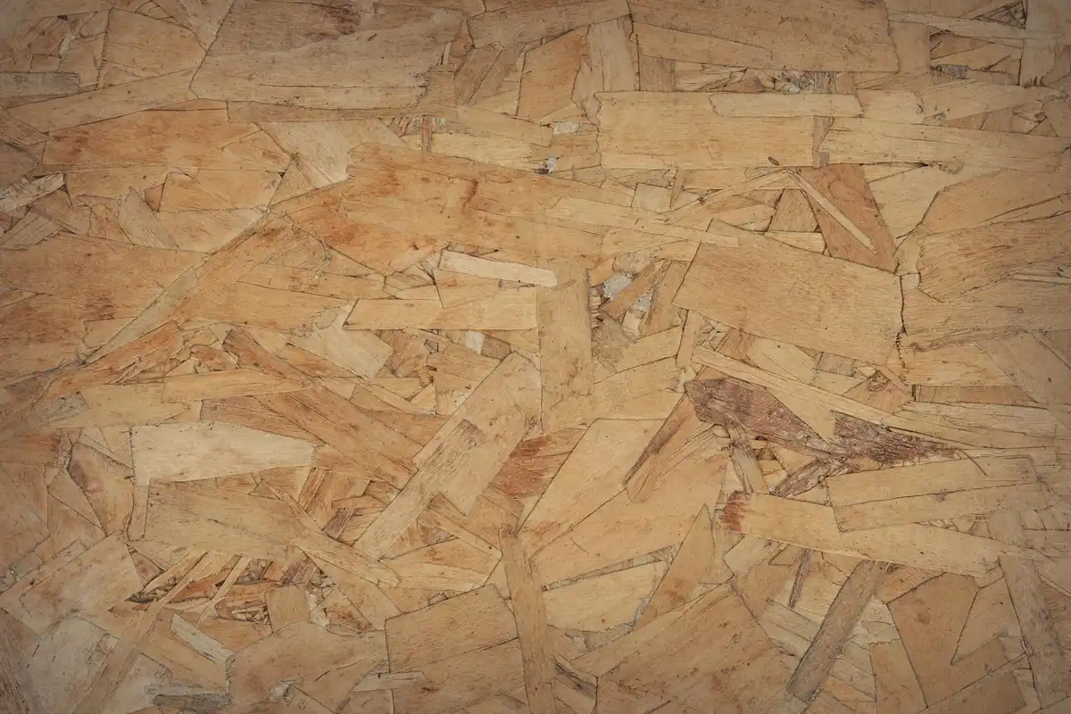 Close-up of OSB plywood showing exposed wood strands