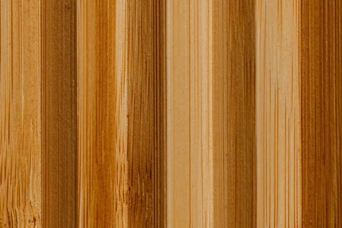 Close-up of vertical pine boards in varying natural tones and grain patterns