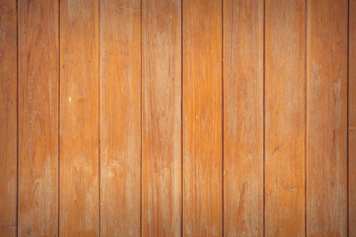 Vertical pine boards with a warm amber patina