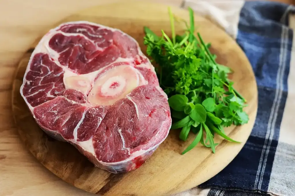 How Do You Safely Sanitize a Wooden Cutting Board After Raw Meat?