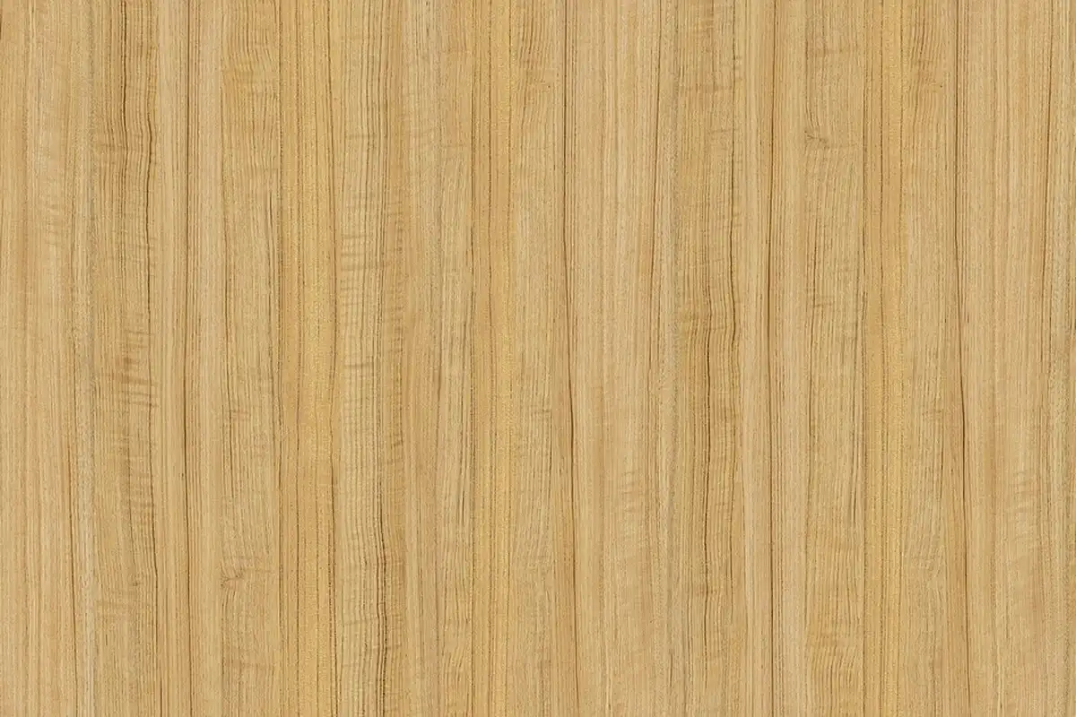 Close-up view of vertical wood grain with warm tones, illustrating the surface prepared for protective topcoats.