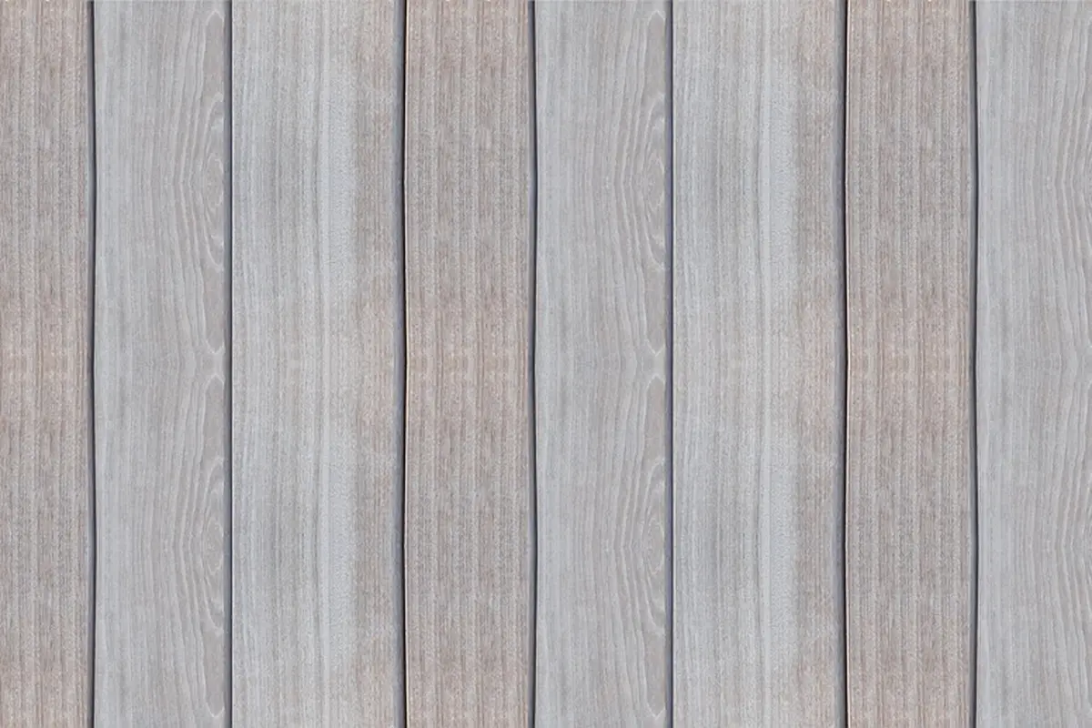 Vertical weathered wooden boards with faded stain, showing natural grain and color variation.