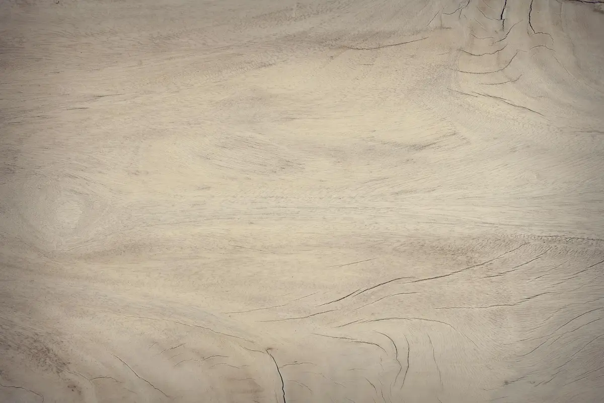Close-up of pale wood grain texture, illustrating a potential mahogany substitute.